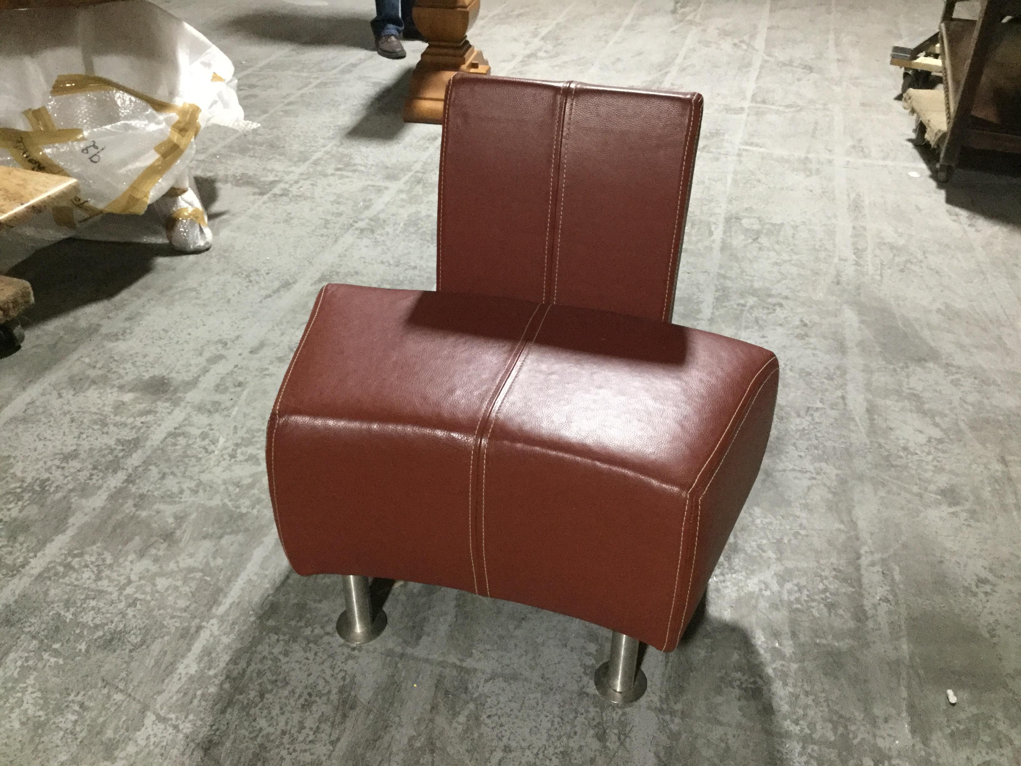 Exceptional Italian Industrial-style Leather salon set. This set includes a curved love seat and 2 side chairs. Made of ox-blood leather cowhide, each piece has detailed white top-stitching on the leather upholstery, and chrome industrial legs. The