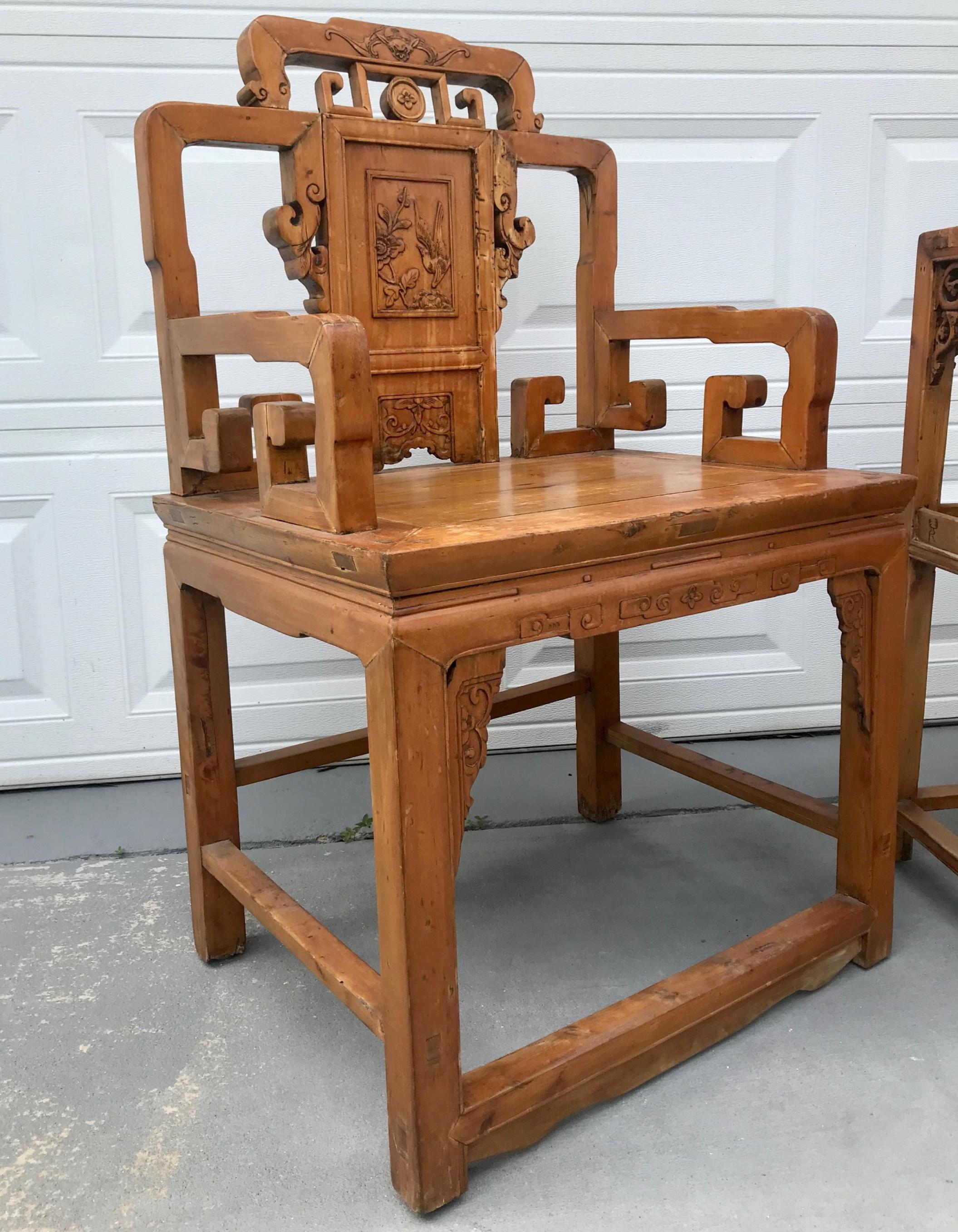 3-piece set of Qing dynasty armchairs and table.

These authentic antique Chinese hand carved screen back armchairs are masterpieces of Qing dynasty furniture. The chairs feature an Archaistic key motif. They are elegant and simple in style. Built