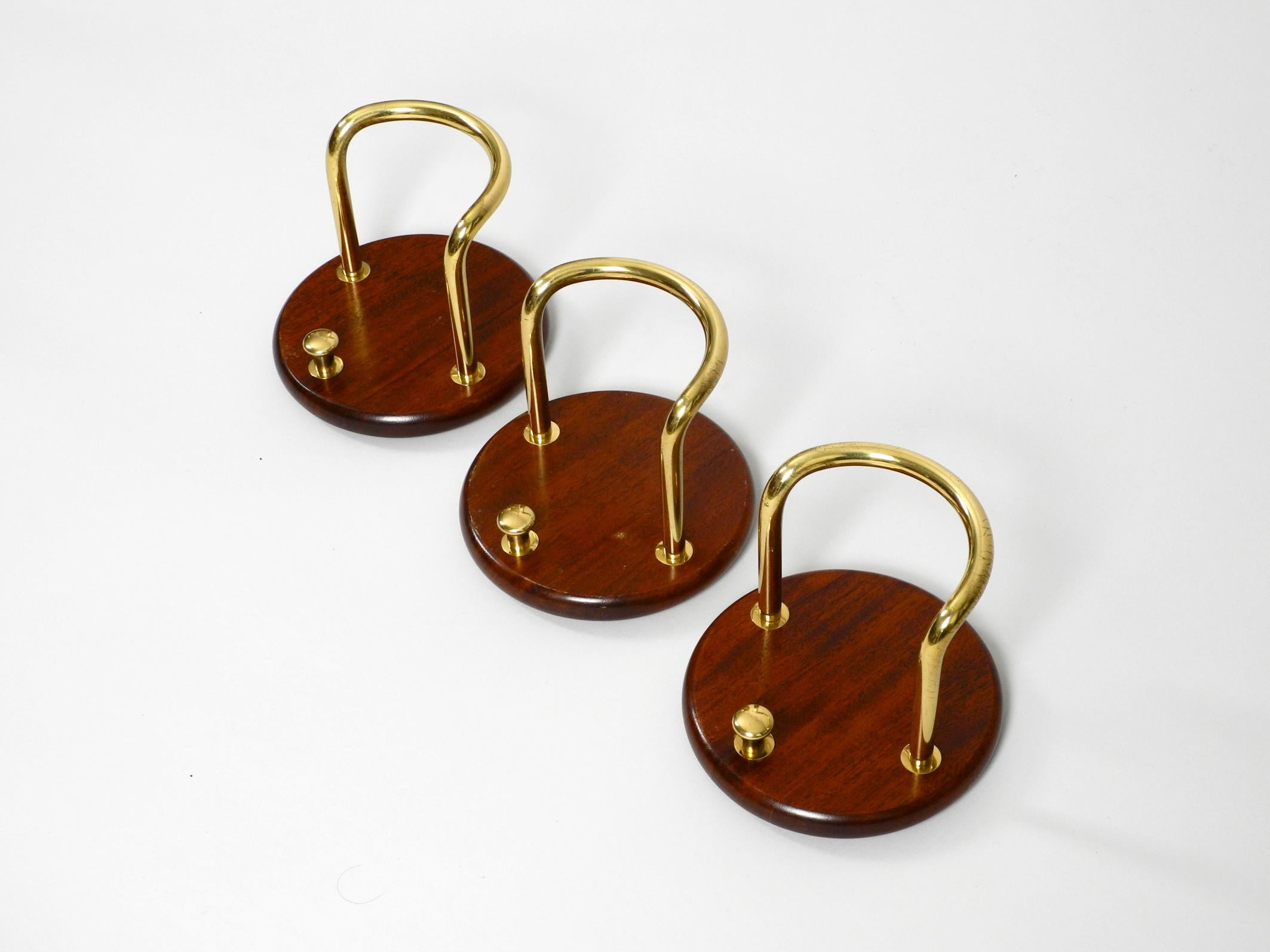 3 Pieces of Very Elegant Large 1970s Wall Hooks Made of Teak and Brass 6
