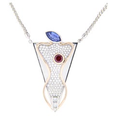 "3 Punti" Love Collection Necklace 18k Gold 
Brilliants, Tanzanite 
Garnet st.