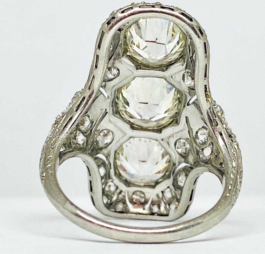 Gilded Age 3 Round Cut Diamond Antique Style Cocktail Ring in Platinum For Sale