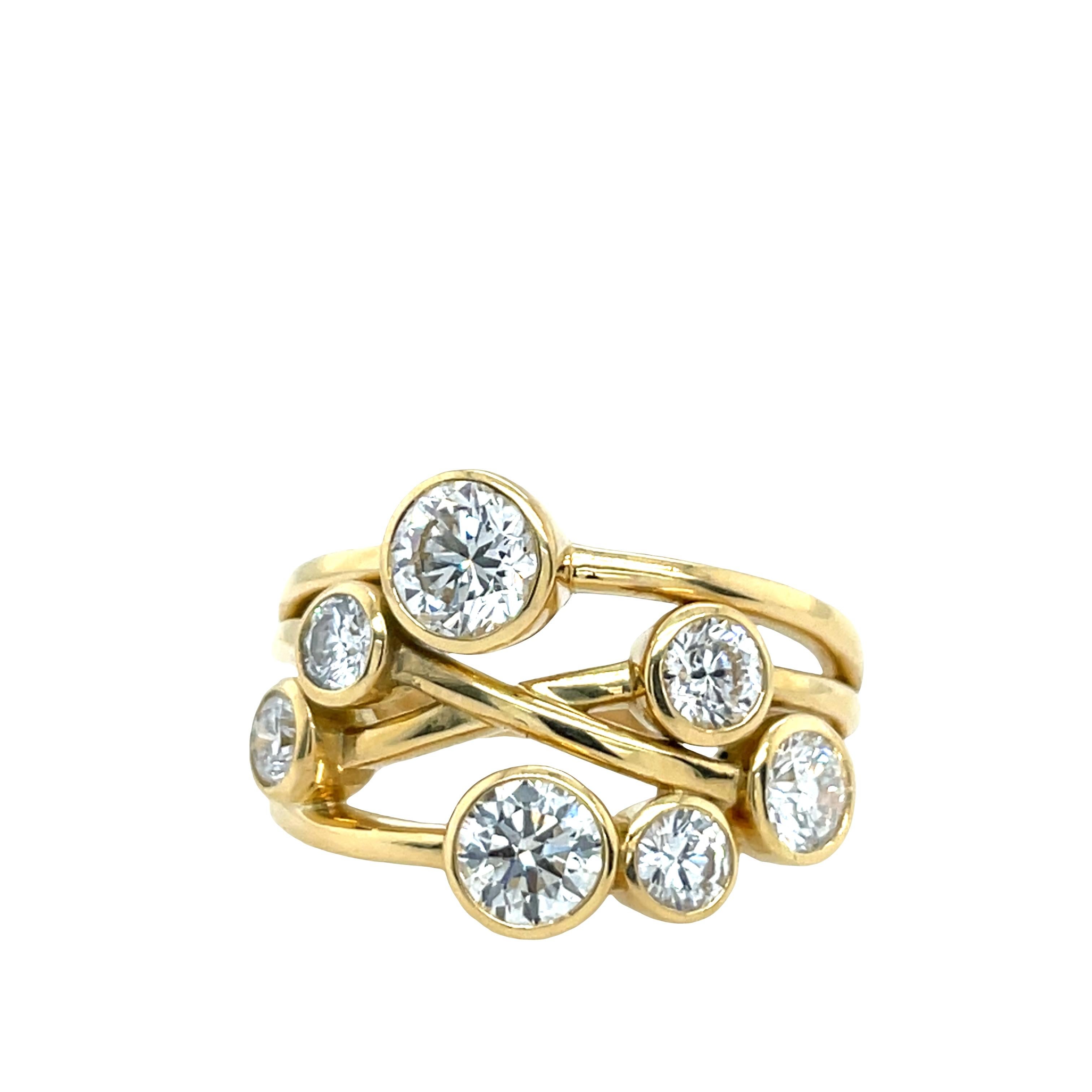 A stylish and contemporary 3-row bubble ring crafted in luxurious 18ct yellow gold, set with 7 natural GIA round diamonds. The playful bubble design adds dimension and sparkle, creating a bold yet elegant look perfect for everyday wear or special