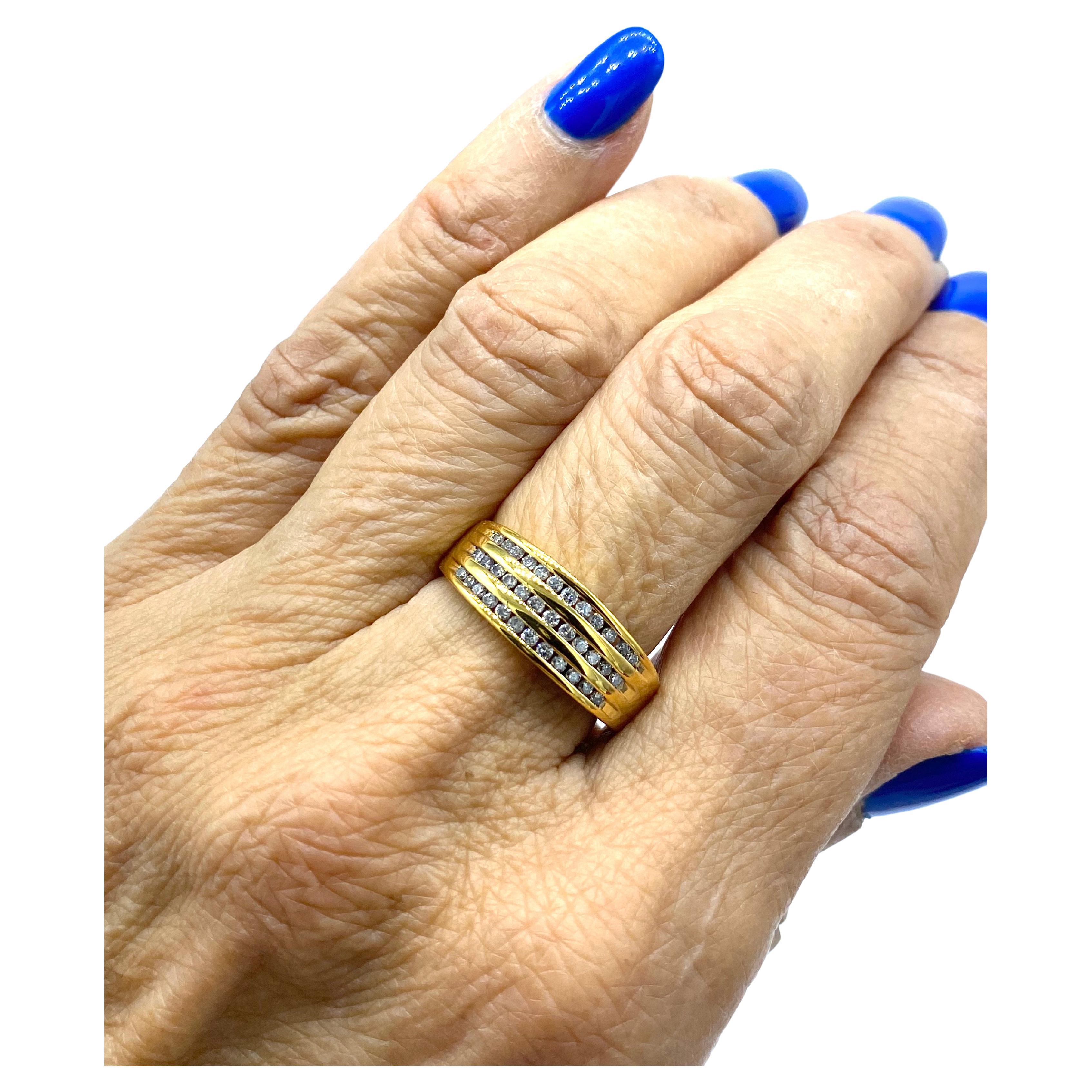 3 Row Channel Diamond Band Yellow Gold Ring
Unisex, the ring is a size 10.25
The diamonds are SI-2 clarity, and color is H
Diamond weight is .36 carat

 The ring width is 7.75 MM. Metal is 10 karat yellow gold
GIA Gemologist inspected & evaluated