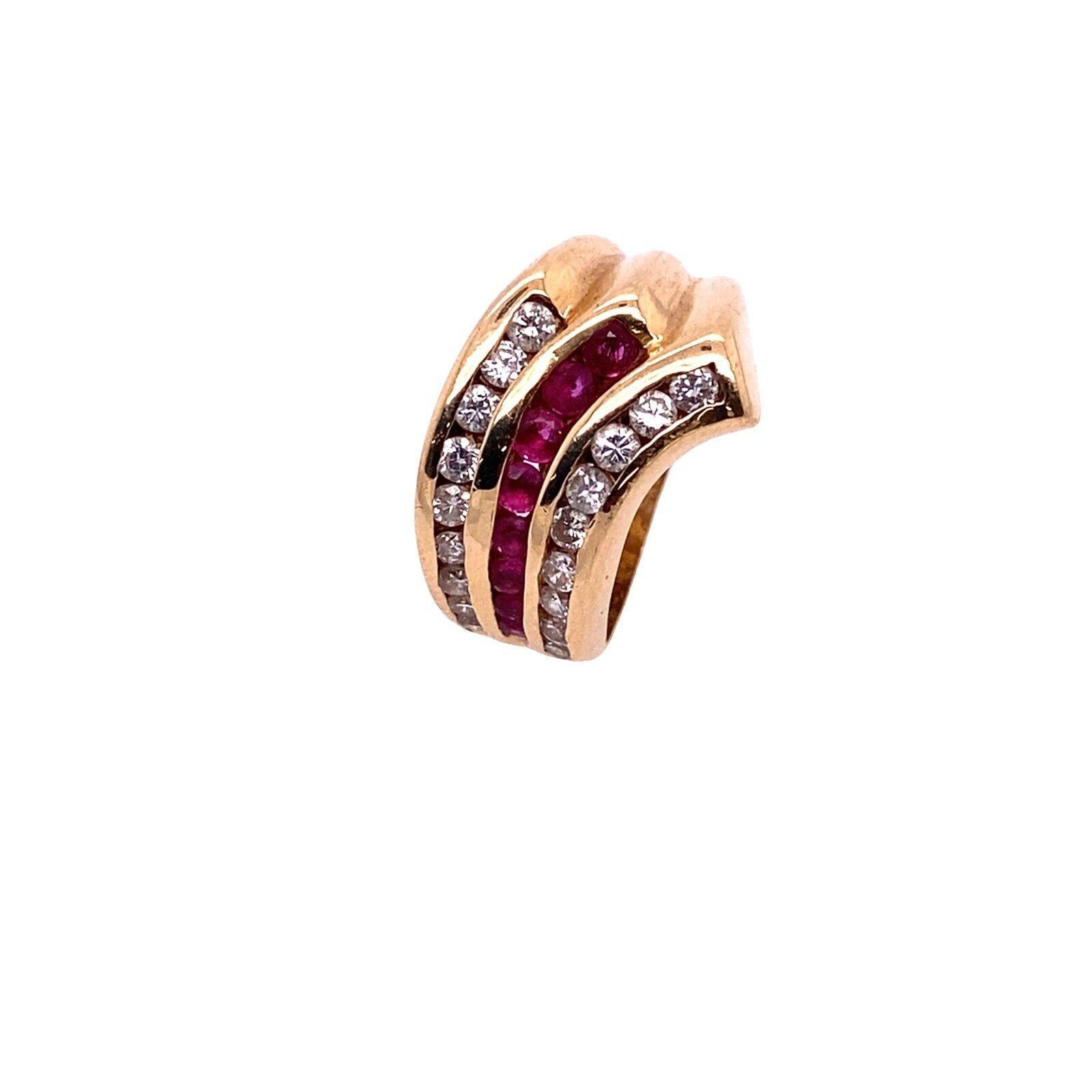 This beautiful diamond dress ring is crafted from 14ct gold and set with a 0.50ct ruby and 0.50ct round brilliant cut diamond. This ring is a timeless piece of art that will compliment any outfit.

Additional Information: 
Width of Band: 4.6mm
Width