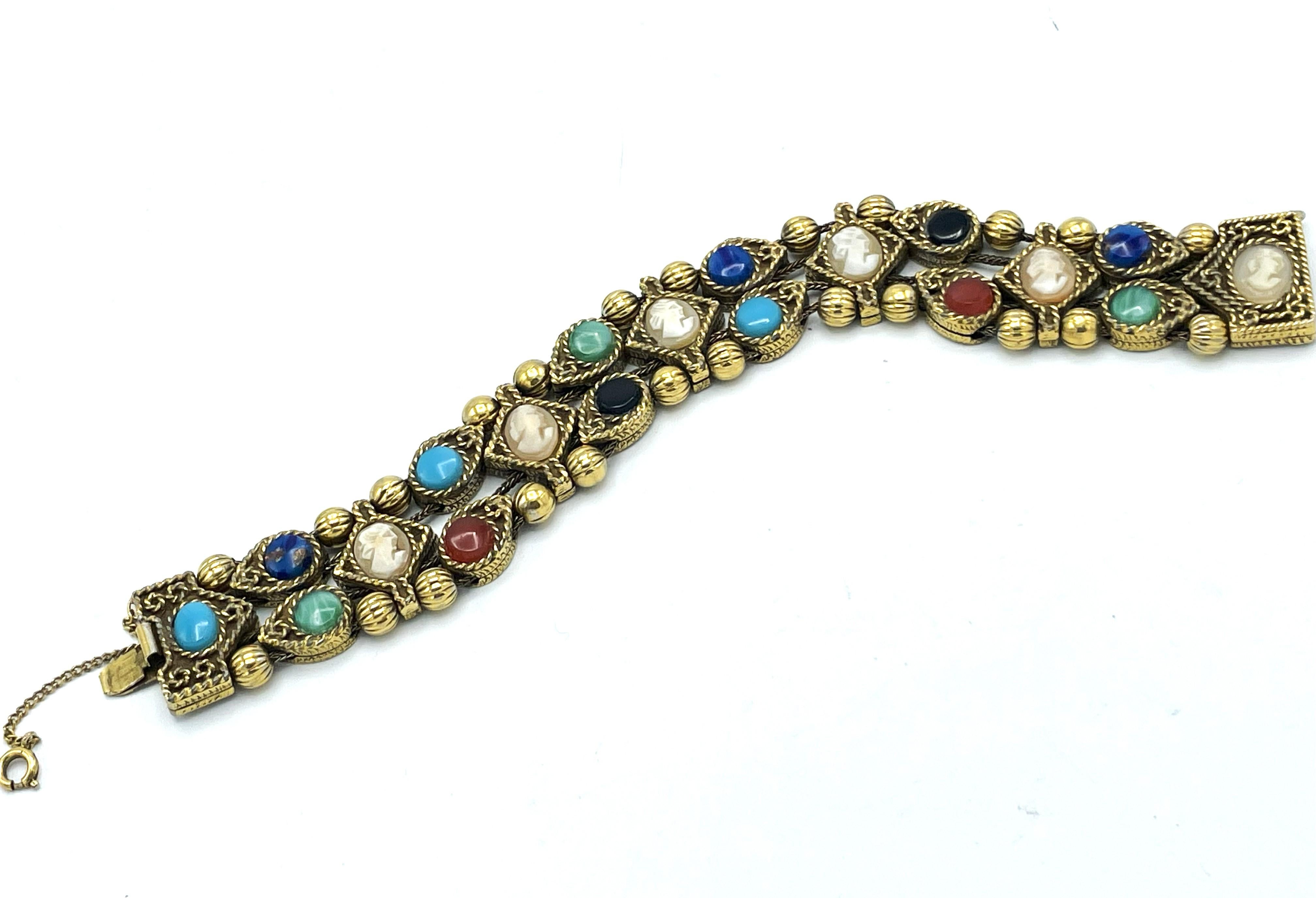Art Deco  3 rows of movable Bracelet with gems and colorful glass stones, gold plated  For Sale
