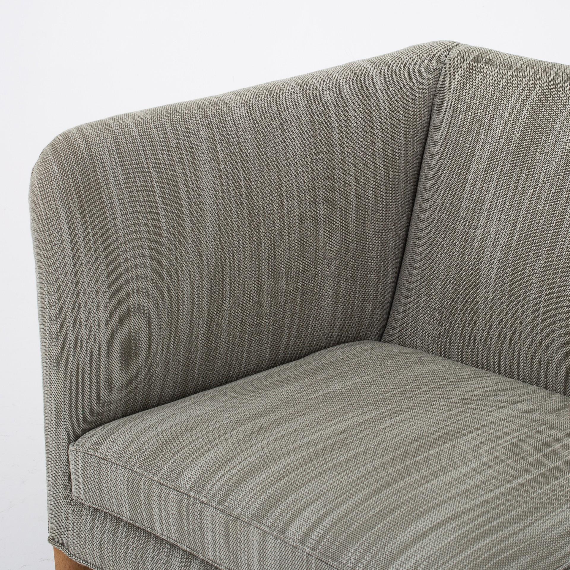 AP 18S – reupholstered 3-seat sofa in green/grey Lila wool col.: 951, legs in oak. Maker Johannes Hansen.