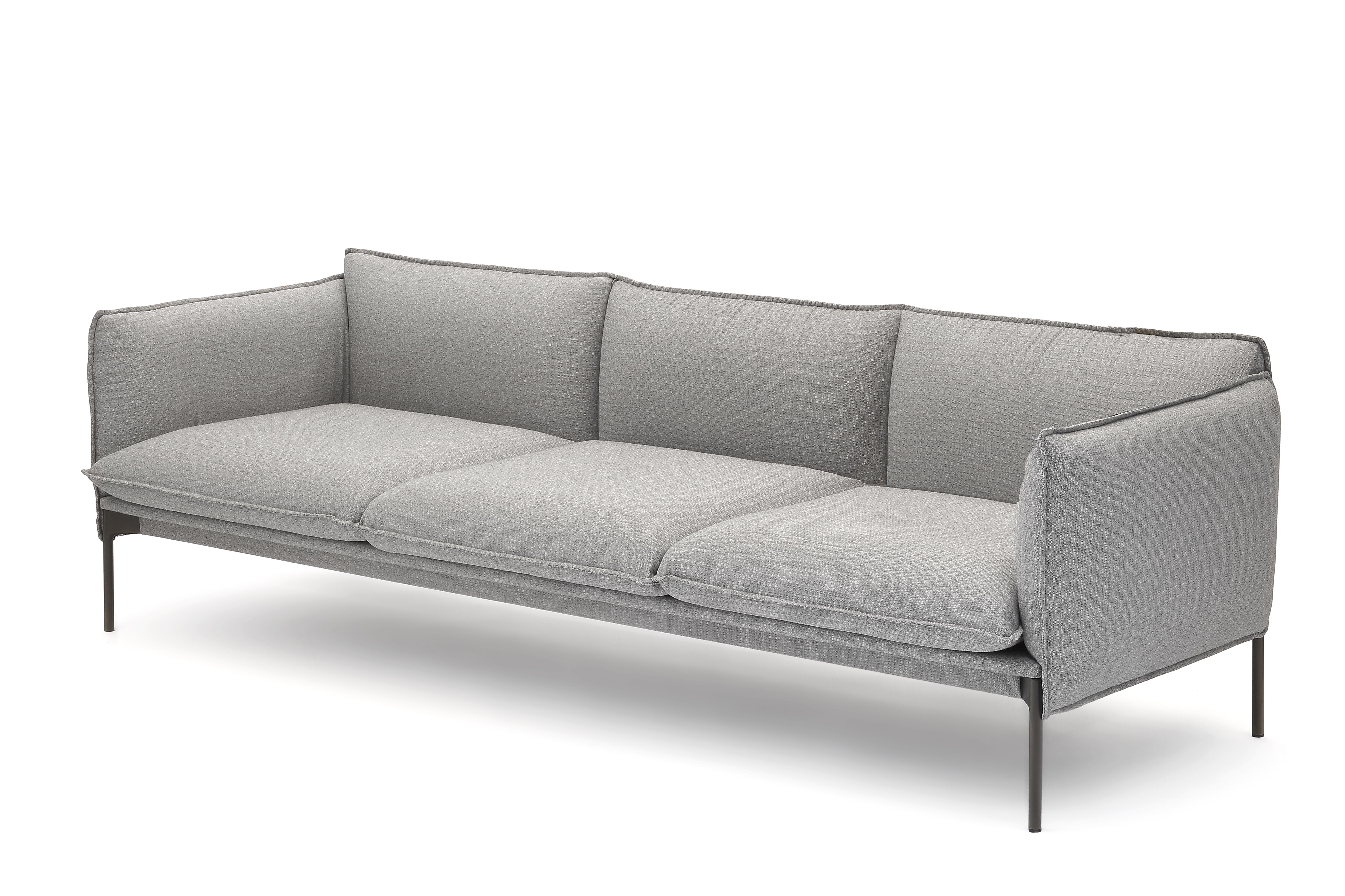 3 seat Palm Springs sofa by Anderssen & Voll
Materials: Polyurethane foam of different densities, covered with fabric or leather. Base in bronze lacquered metal.
Technique: Lacquered metal, upholstered in fabric. 
Dimensions: D 83 x W 230 x H 69