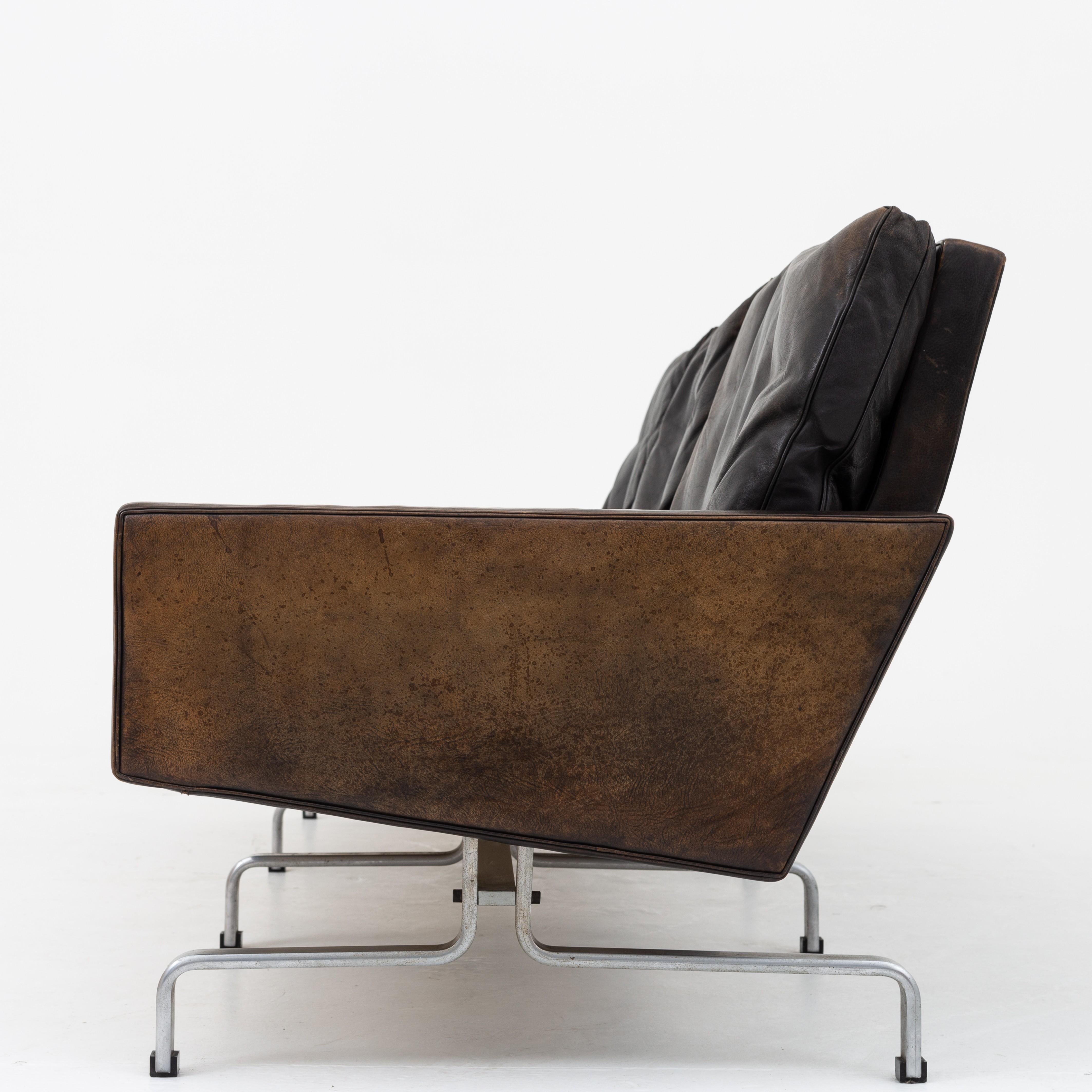 PK 31/3 - 3-seat sofa in original black leather with matte chromed steel frame. Designed in 1958. Maker E. Kold Christensen.