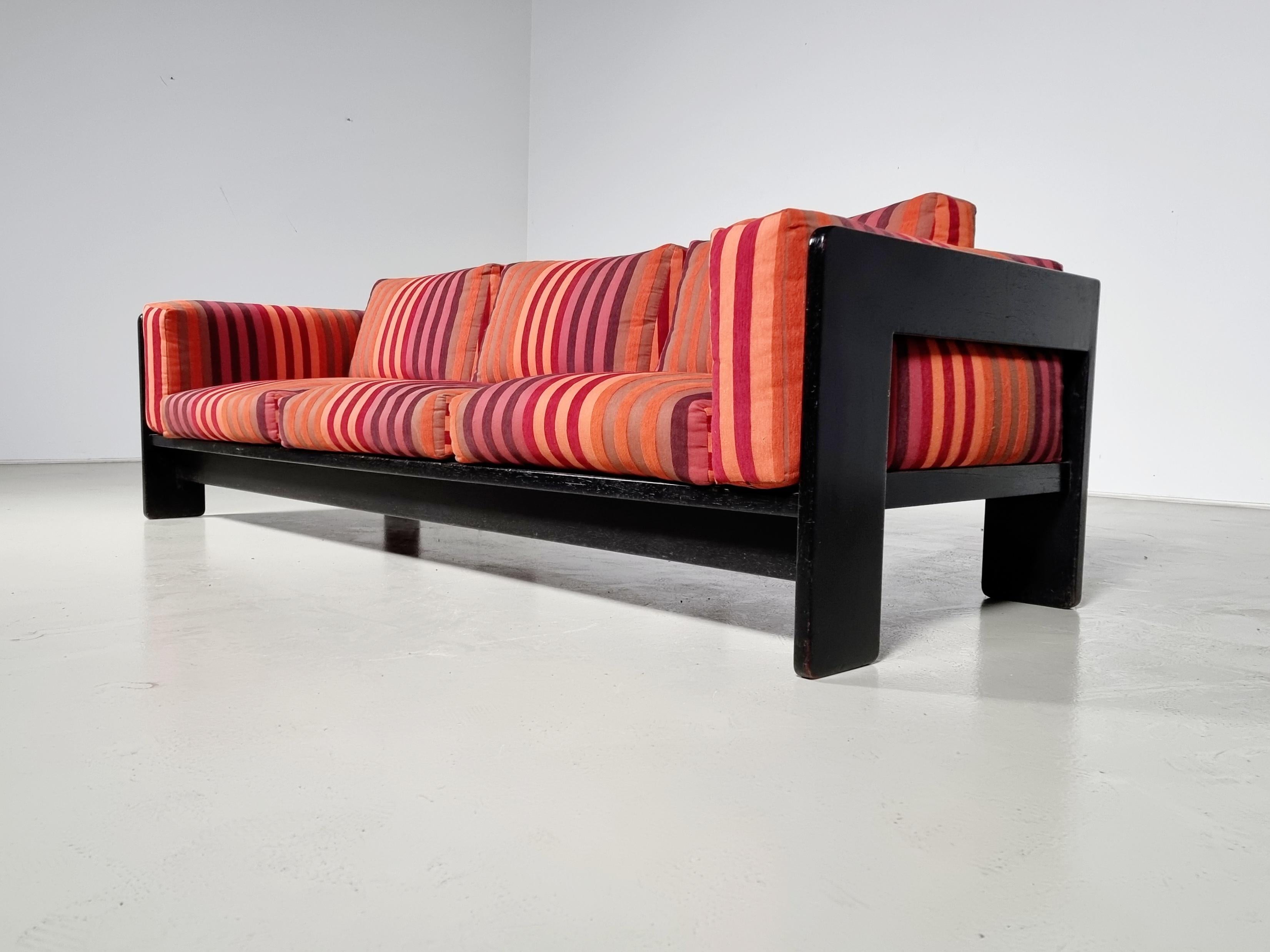 A three-seater sofa from the Bastiano series, designed by the Italian designer duo Afra & Tobia Scarpa for Knoll, Italy, circa 1960.

The frame is made of black painted oak wood, a loose upholstered seat- and back cushions. The cushions still have