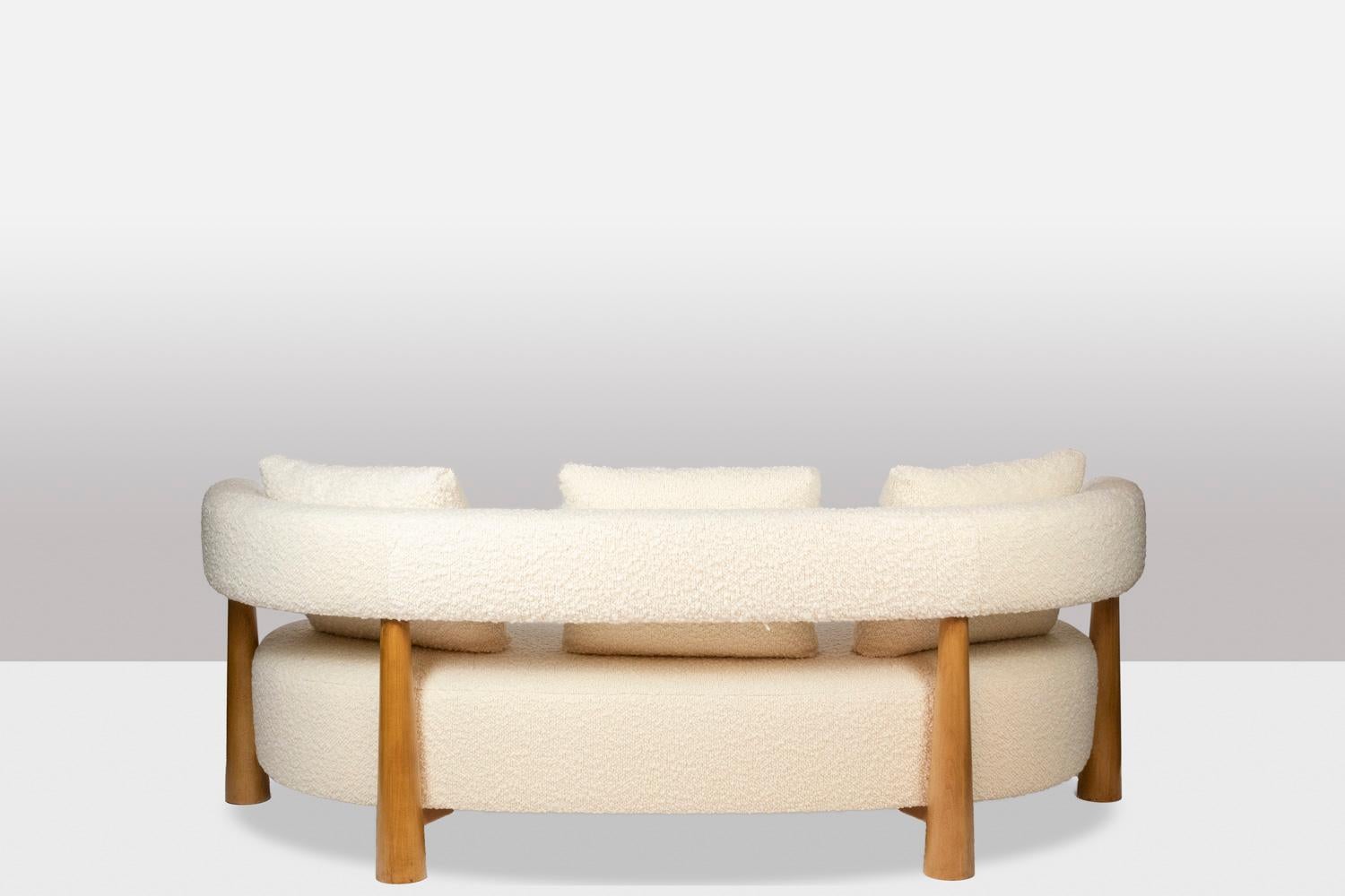 Beech 3-seater “bean” shaped sofa. Contemporary work. For Sale