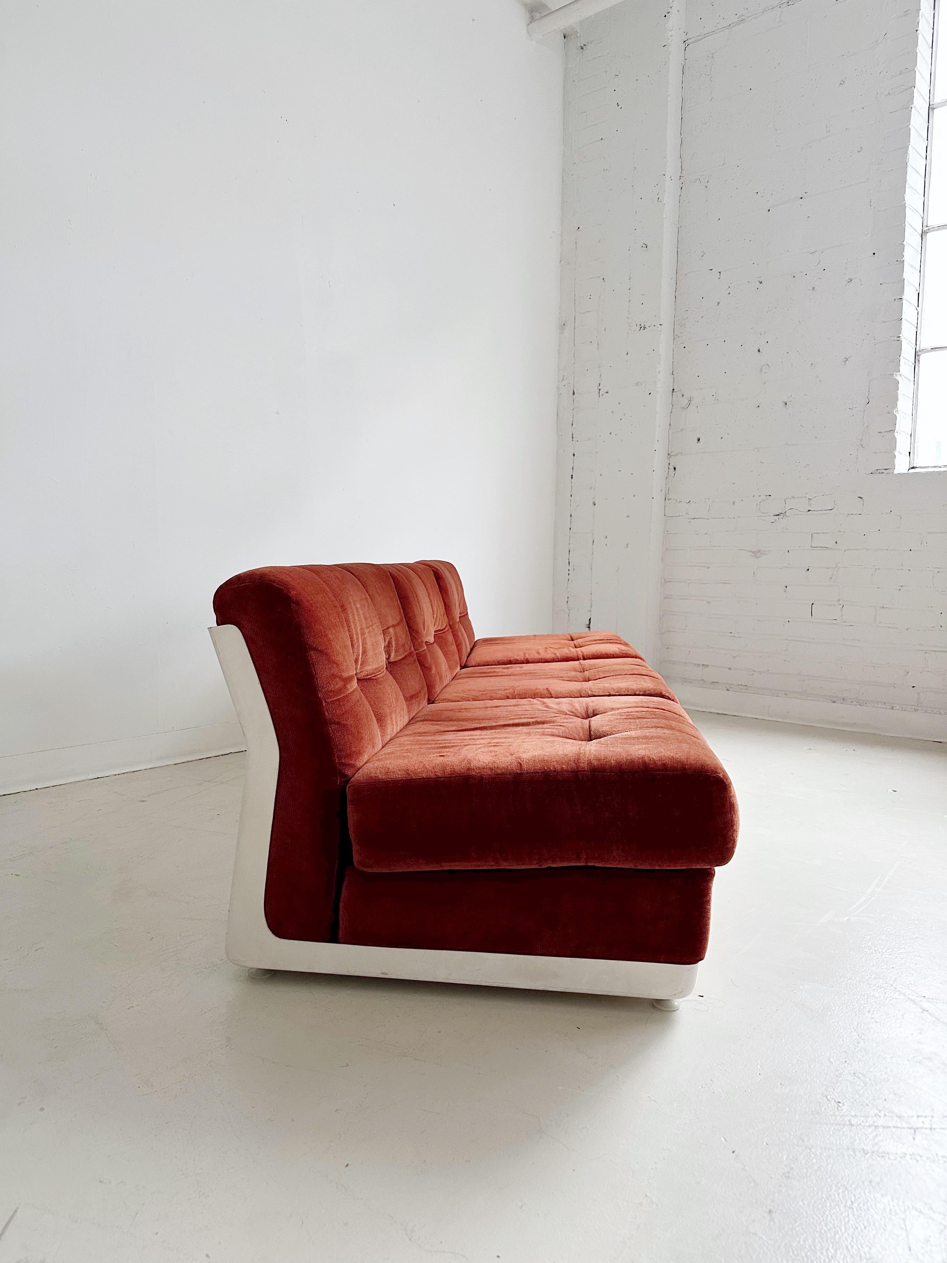 3 Seater Modular Sofa in the style of Amanta by Mario Bellini, 70's

Features a fibreglass frame and Red Brick Velvet upholstery

//

Dimensions:

29”W x 31”D x 25”H  seat height 15