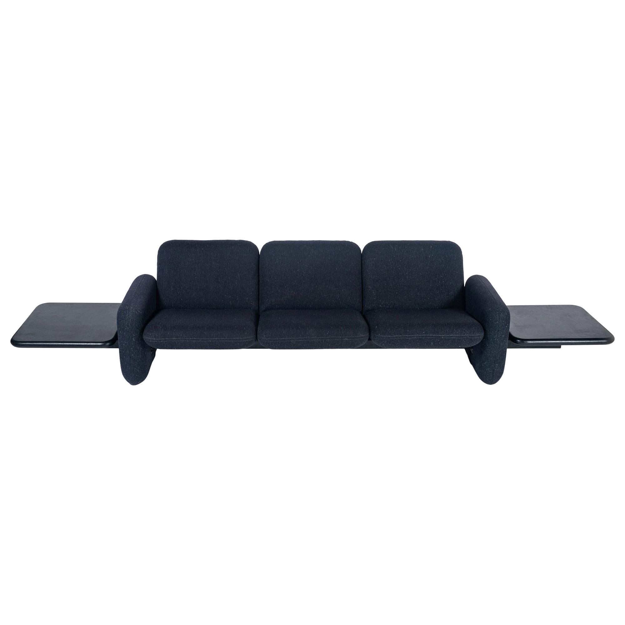 Couch with side table attached outlet