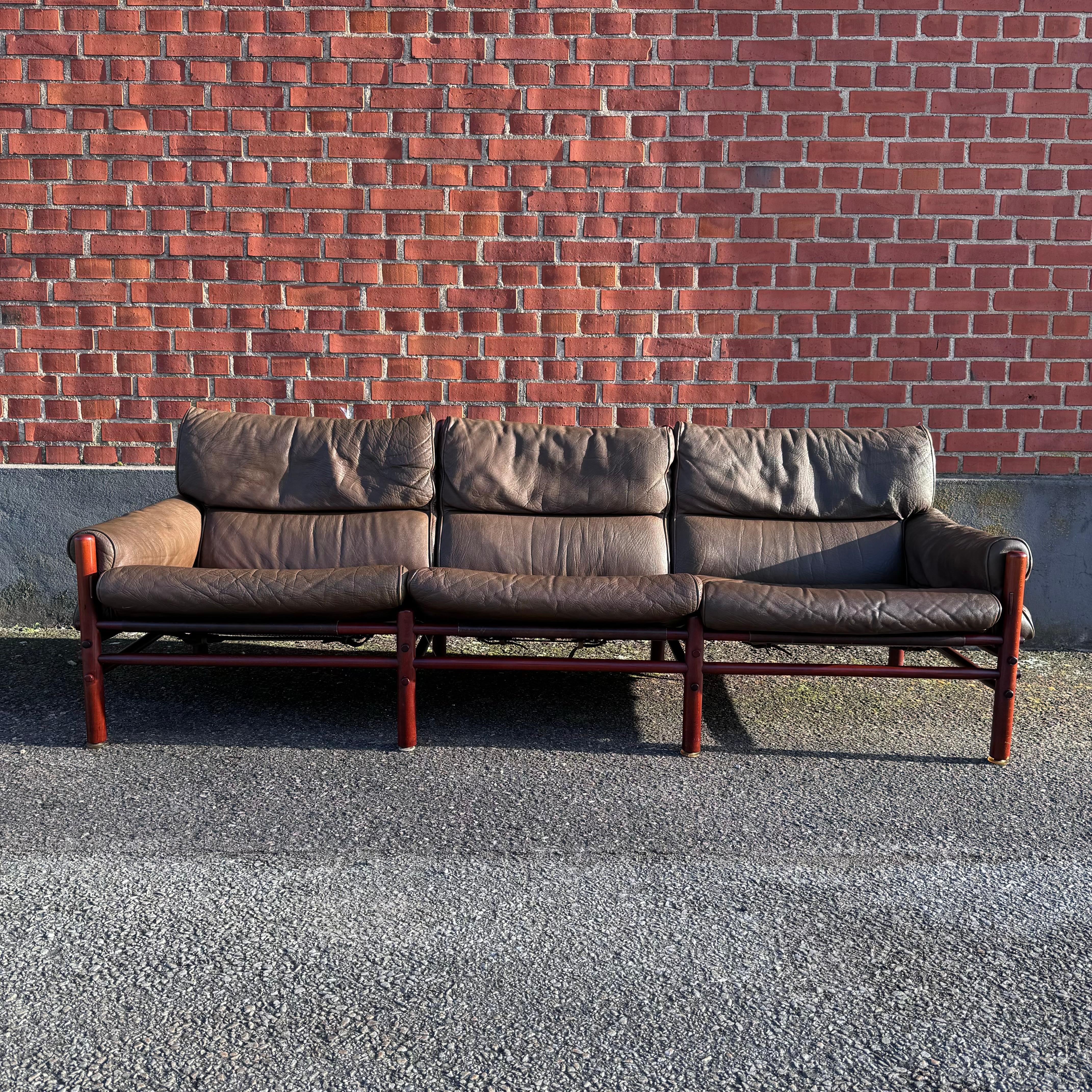 3-seater sofa ”Kontiki” designed by Arne Norell in original buffalo leather. Produced by Arne Norell AB in Aneby, Sweden. 