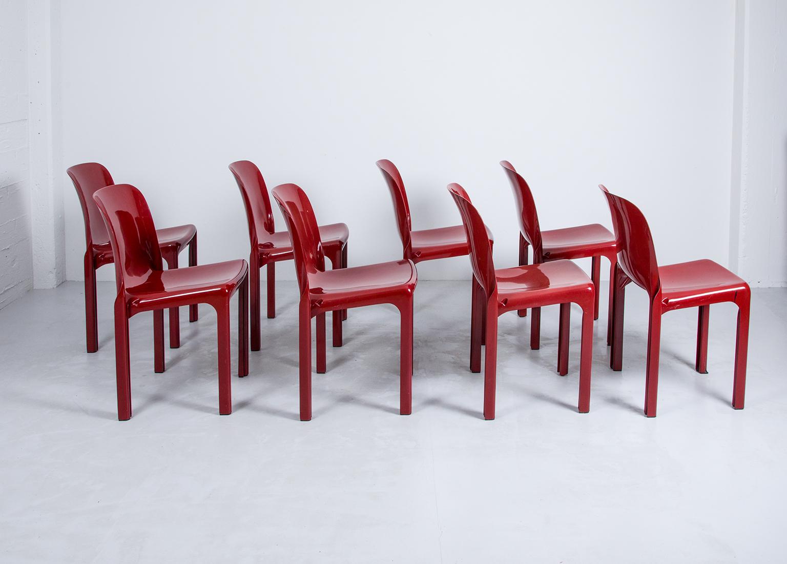 Mid-Century Modern 3 Selene Stacking Chairs by Vico Magistretti for Artemide in Dark Red For Sale
