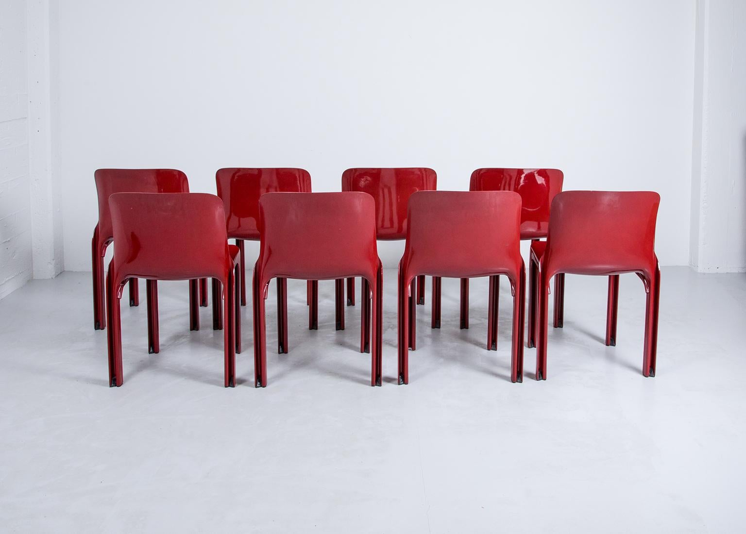 Italian 3 Selene Stacking Chairs by Vico Magistretti for Artemide in Dark Red For Sale