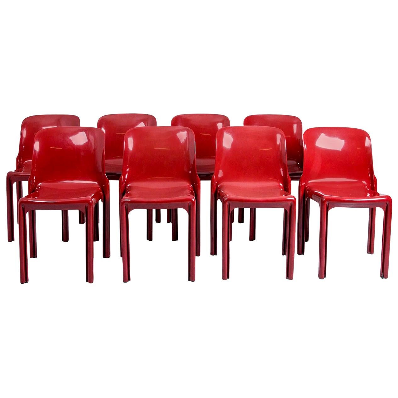 3 Selene Stacking Chairs by Vico Magistretti for Artemide in Dark Red For Sale