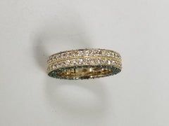 3 sided Diamond and Emerald Pave Eternity Ring