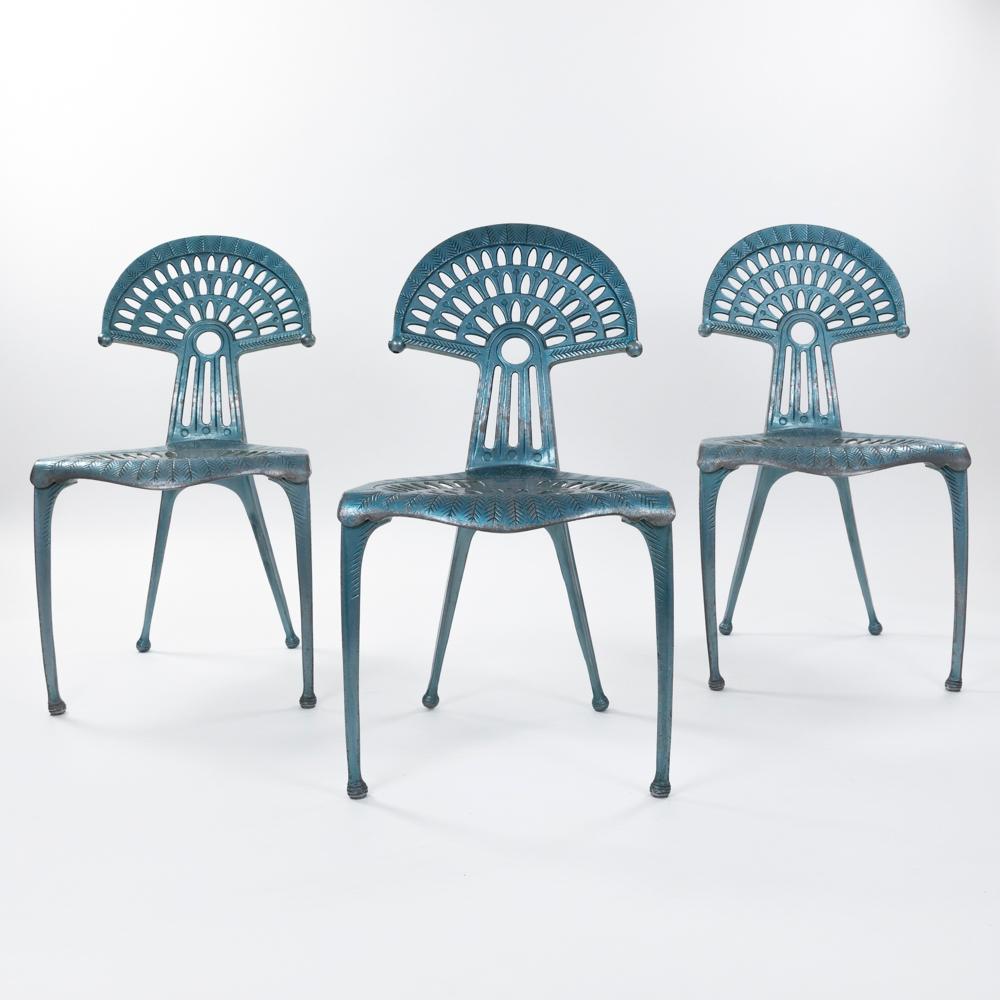 
Exceptional sculptural chairs in cast aluminum with stylized naturalistic decorations and strong 
design character, signed by Oscar Tusquets Blanca - stamped on the back side.
Slightly inclined backrest and slightly curved seat shell, therefore