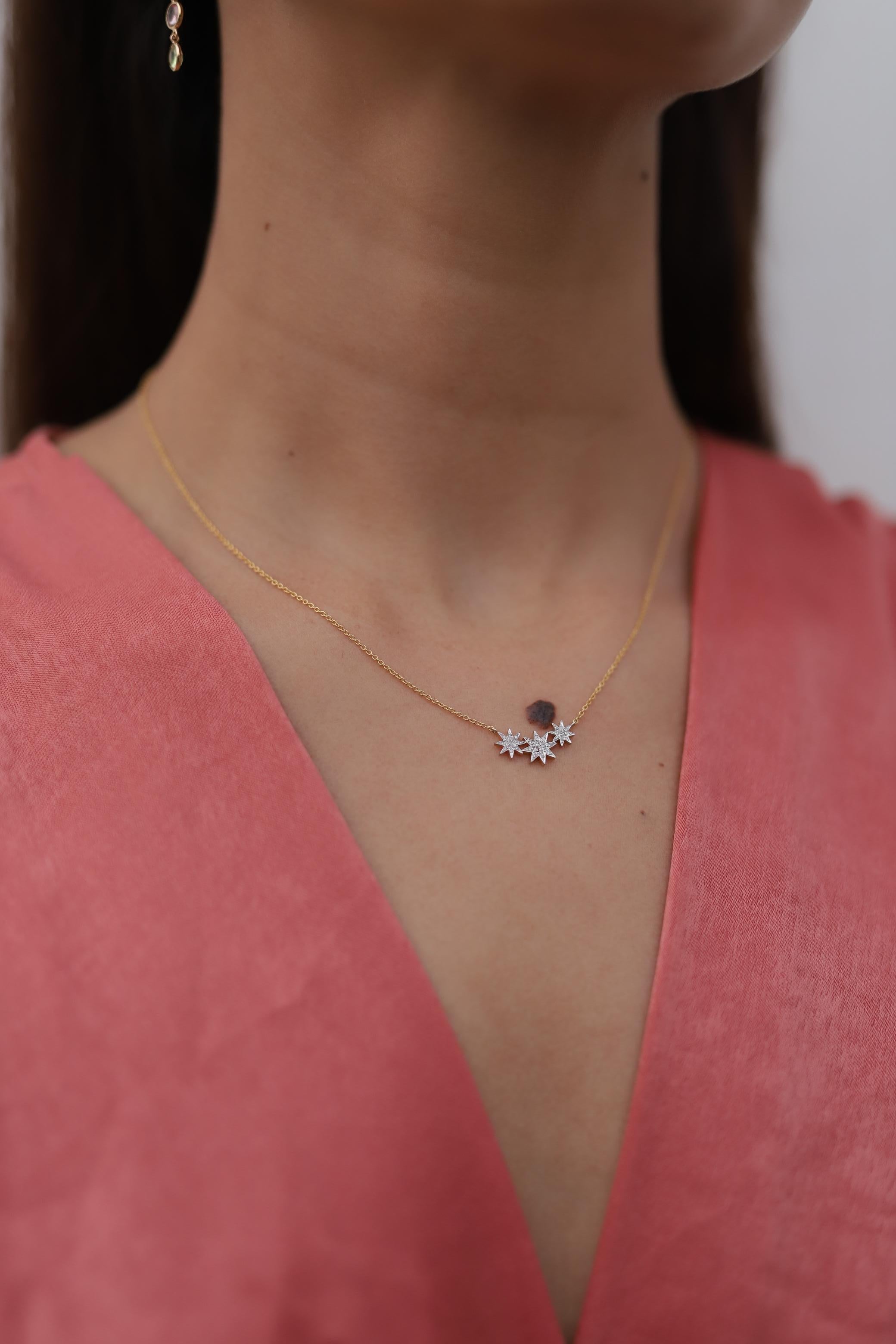 3 Star Diamond Necklace in 18K Gold studded with round cut diamond. This stunning piece of jewelry instantly elevates a casual look or dressy outfit. 
April birthstone diamond brings love, fame, success and prosperity.
Designed with diamonds studded