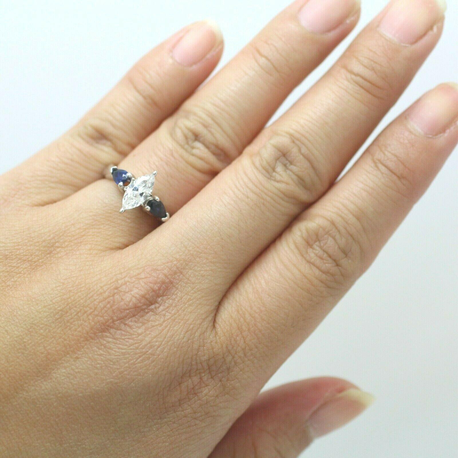 3 stone marquise cut diamond ring