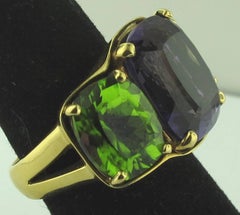 3-Stone Amethyst and Peridot Ring, set in 18 Karat Yellow Gold