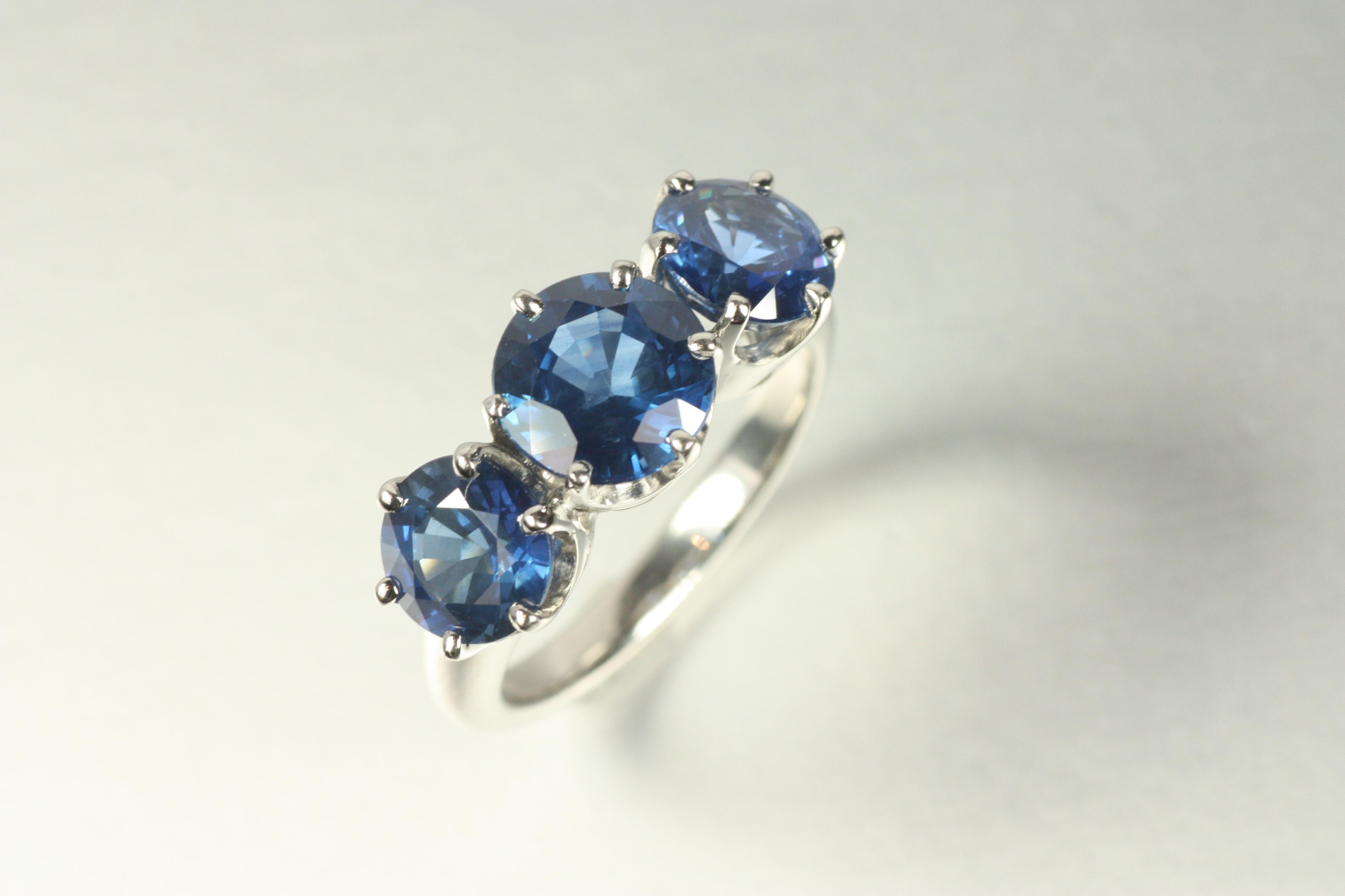 Modern 3-Stone Blue Sapphire Ring – 4.51cttw in Platinum Pronged Setting For Sale