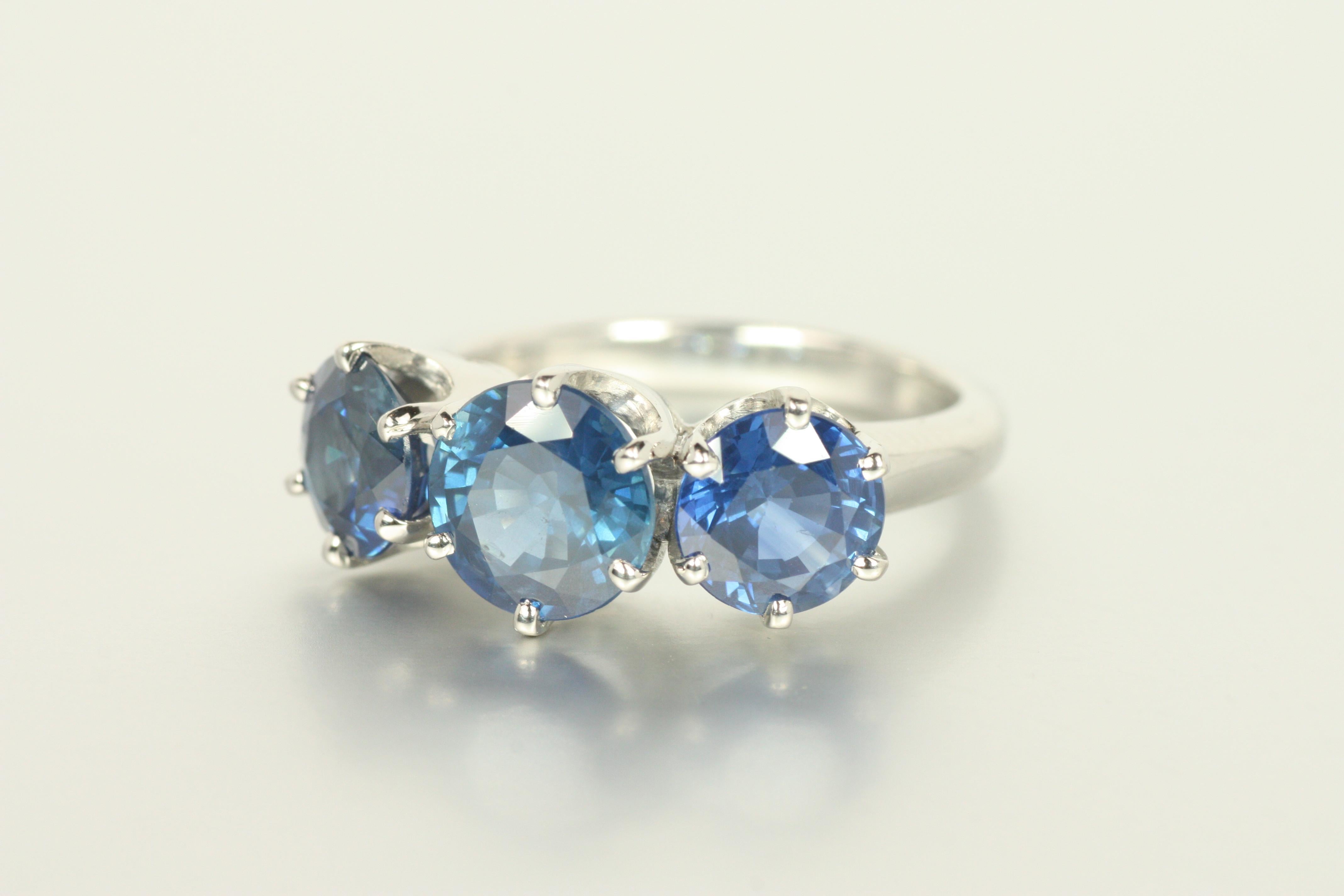 Round Cut 3-Stone Blue Sapphire Ring – 4.51cttw in Platinum Pronged Setting For Sale