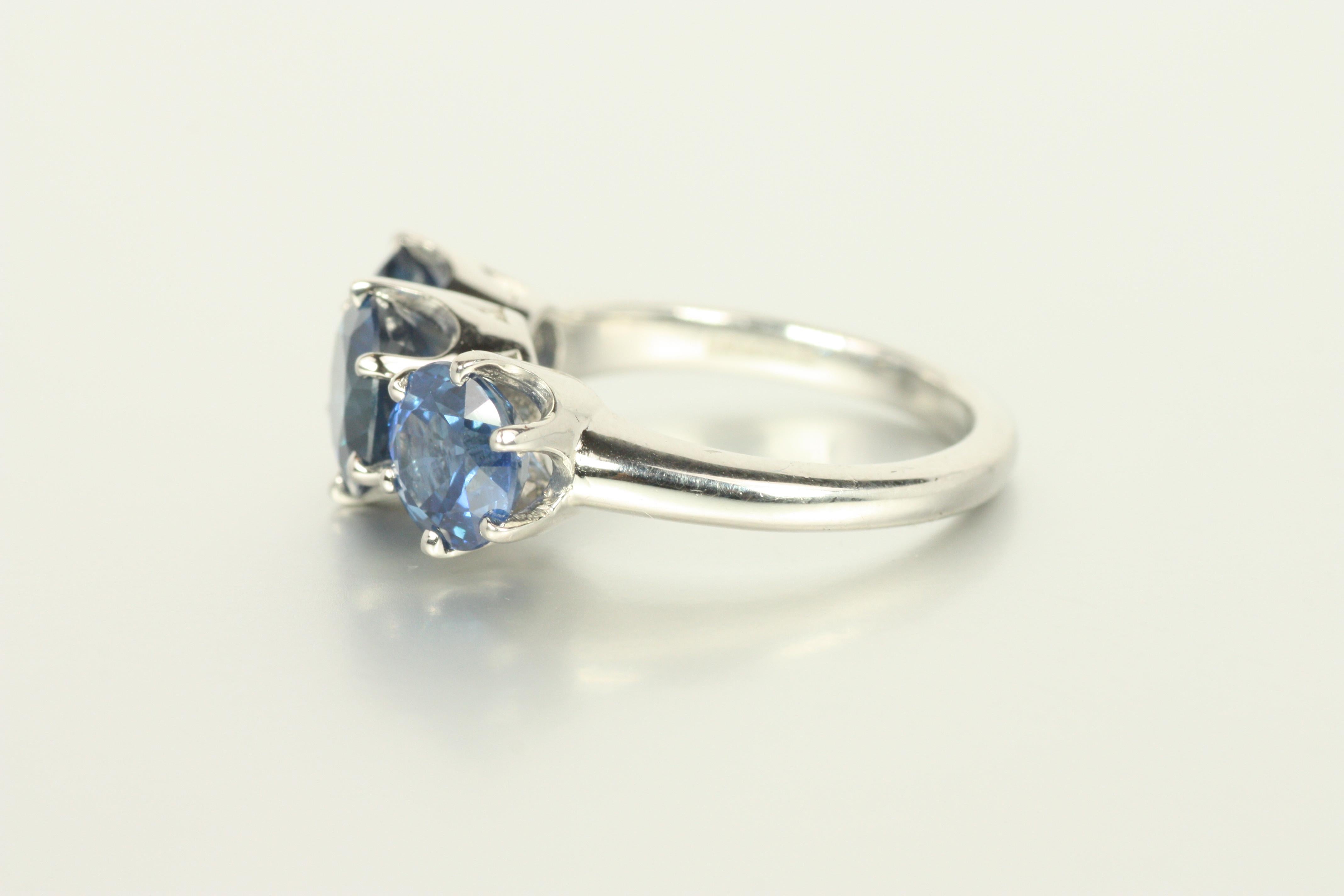 Women's 3-Stone Blue Sapphire Ring – 4.51cttw in Platinum Pronged Setting For Sale