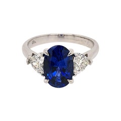 3-Stone Blue Sapphire Ring with Heart Shape Diamonds