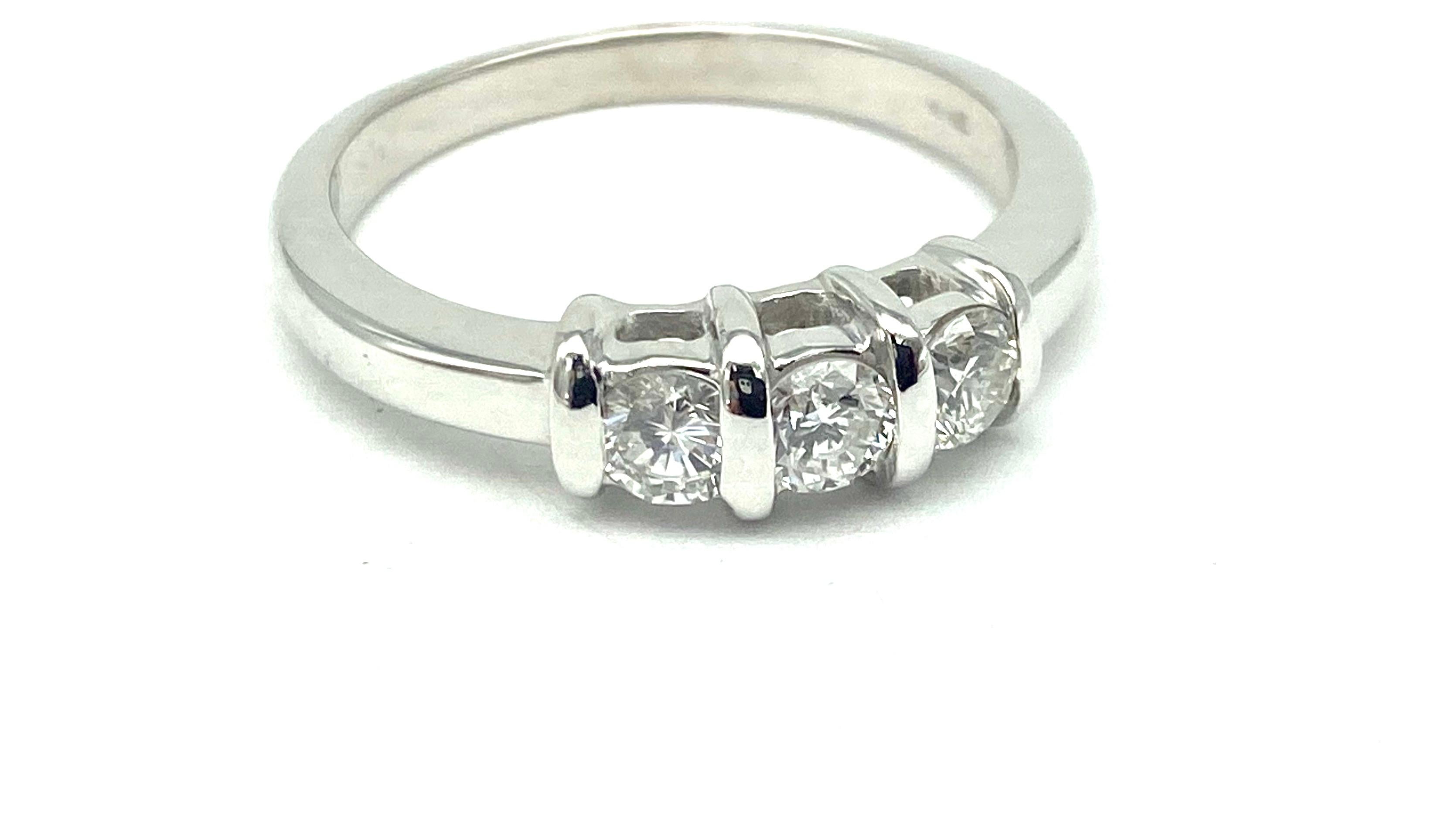 Contemporary 3 Stone Diamond Anniversary Ring .75 CTW 18 Karat White Gold