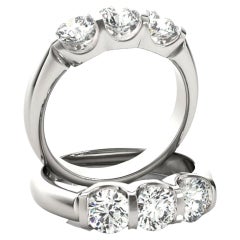 3 Stone Diamond Anniversary Ring .75 CTW 18 Karat White Gold
