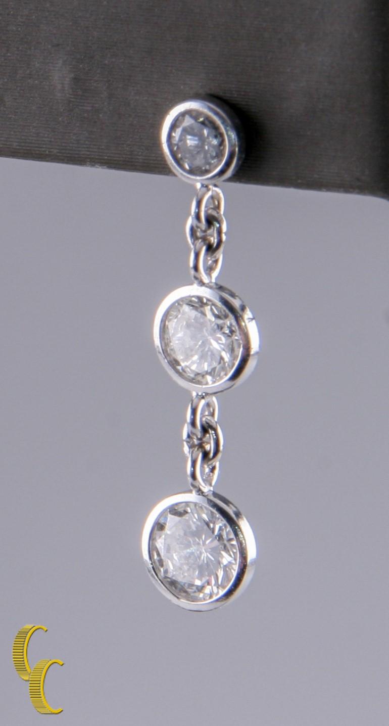 Round Cut 3-Stone Diamond Bezel Set 1.80 Carat 14 Karat White Gold Drop Dangle Earrings For Sale