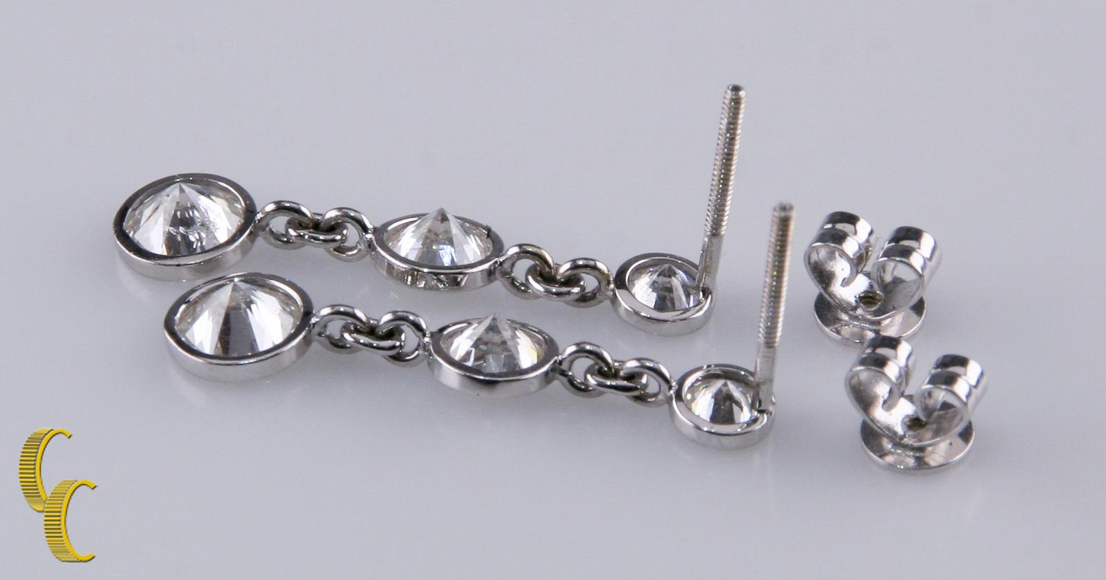 3-Stone Diamond Bezel Set 1.80 Carat 14 Karat White Gold Drop Dangle Earrings In Excellent Condition For Sale In Sherman Oaks, CA