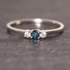 3 Stone Diamond Ring 14 karat White Gold Blue and White Diamonds Thin Gold Ring