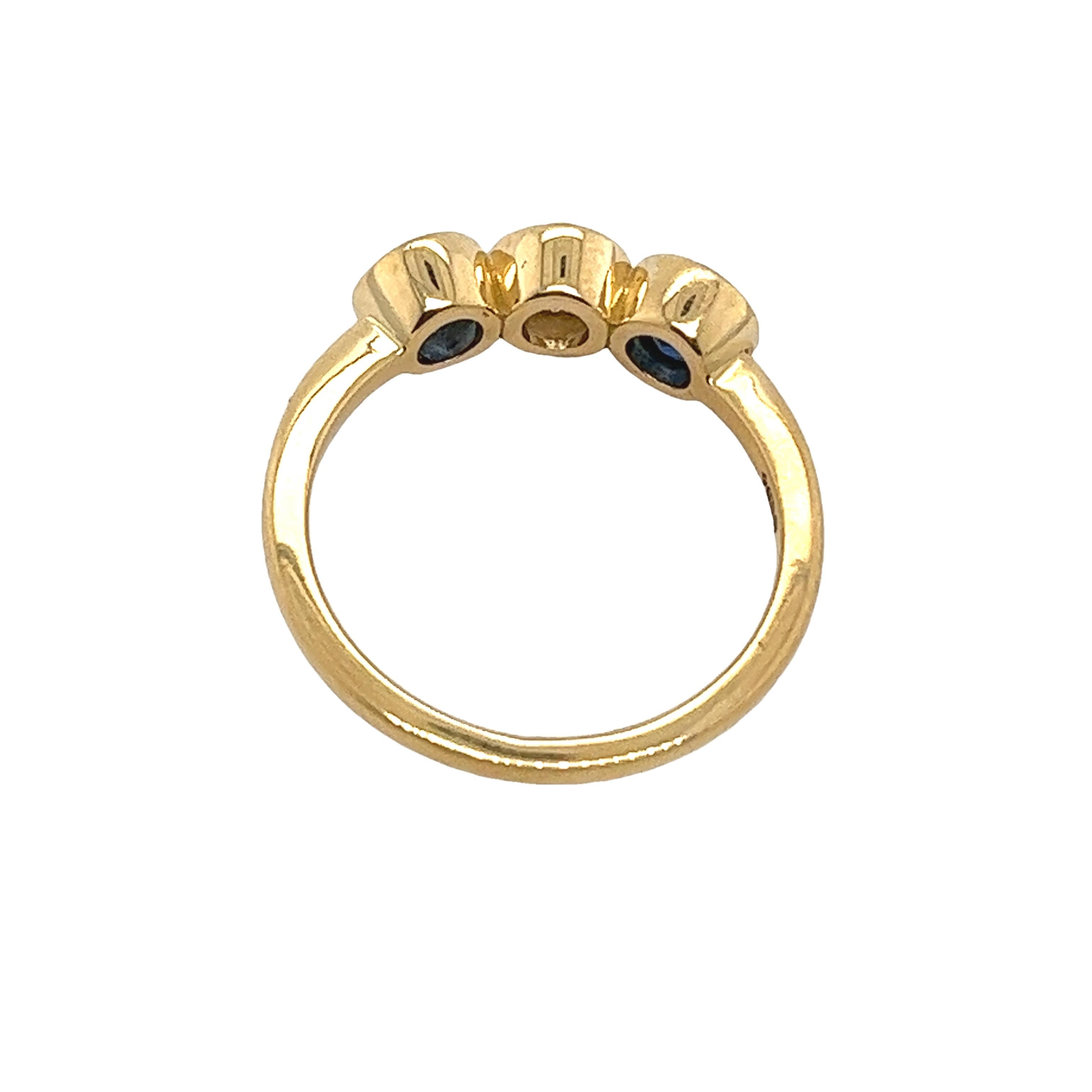 3-Stone Diamond Ring, Set With 1 Round Brilliant Diamonds & 2 Sapphires For Sale 1