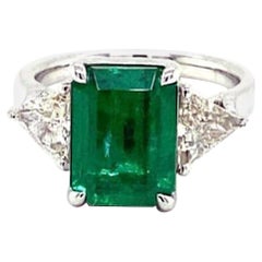emerald and trillion cut diamond ring 3 Stone Emerald and Trillion Diamond Ring