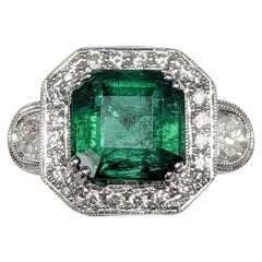 3-Stone Emerald Cut Emerald and  White Diamond Ring