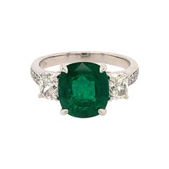 3-Stone Emerald Ring with Cushion White Diamonds with Diamonds on the Shanks