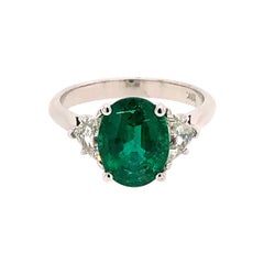 3-Stone Emerald Ring with Epaulet White Diamonds