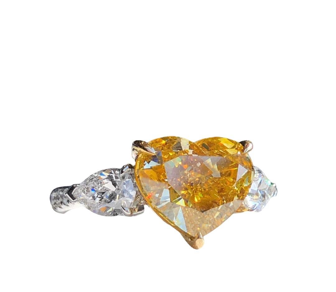 Women's 3 stone engagement ring in 5 carat heart cut Deep Yellow diamond GIA certified For Sale