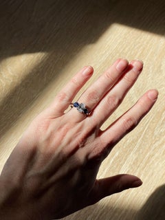 3 Stone Engagement Ring Oval Cut Diamond with Round Sapphire Side Stones