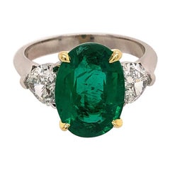 3-Stone Oval Emerald and Heart Shape Diamond Ring