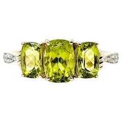 3-Stone Peridot 
Diamond Ring in 14k Yellow Gold