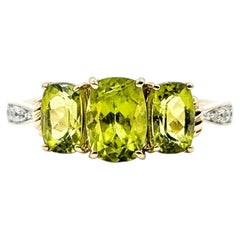 3-Stone Peridot & Diamond Ring in 14k Yellow Gold