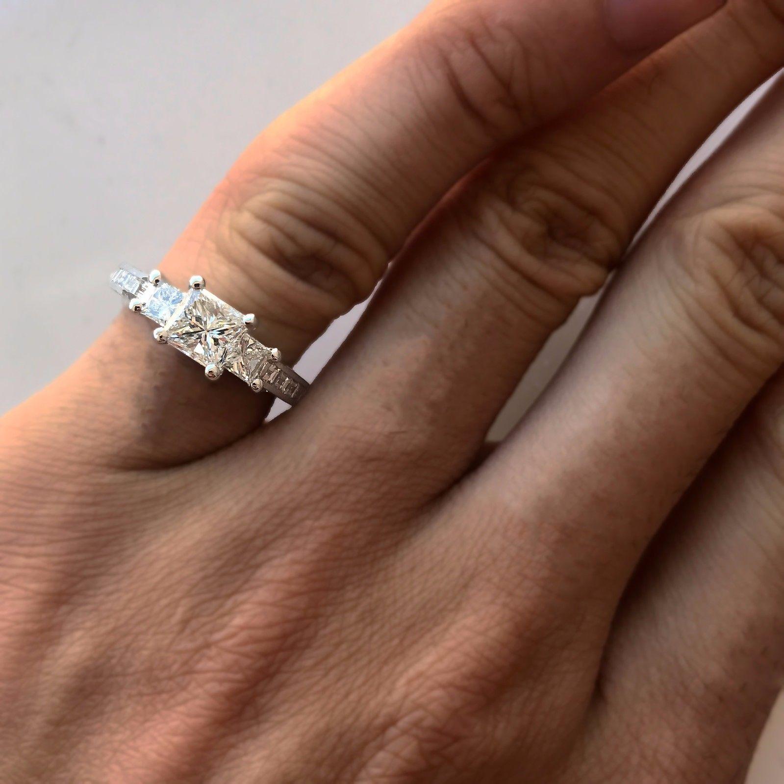 3 stone engagement ring with baguettes