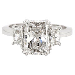 3-Stone Ring w/ GIA Certified E/SI1 3.01ct. Radiant Cut Diamond.  D3.84ct.t.w.