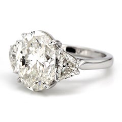 3-Stone Ring w/ GIA Certified I/SI1 8.04ct. Oval Diamond Center.  D9.62ct.t.w.