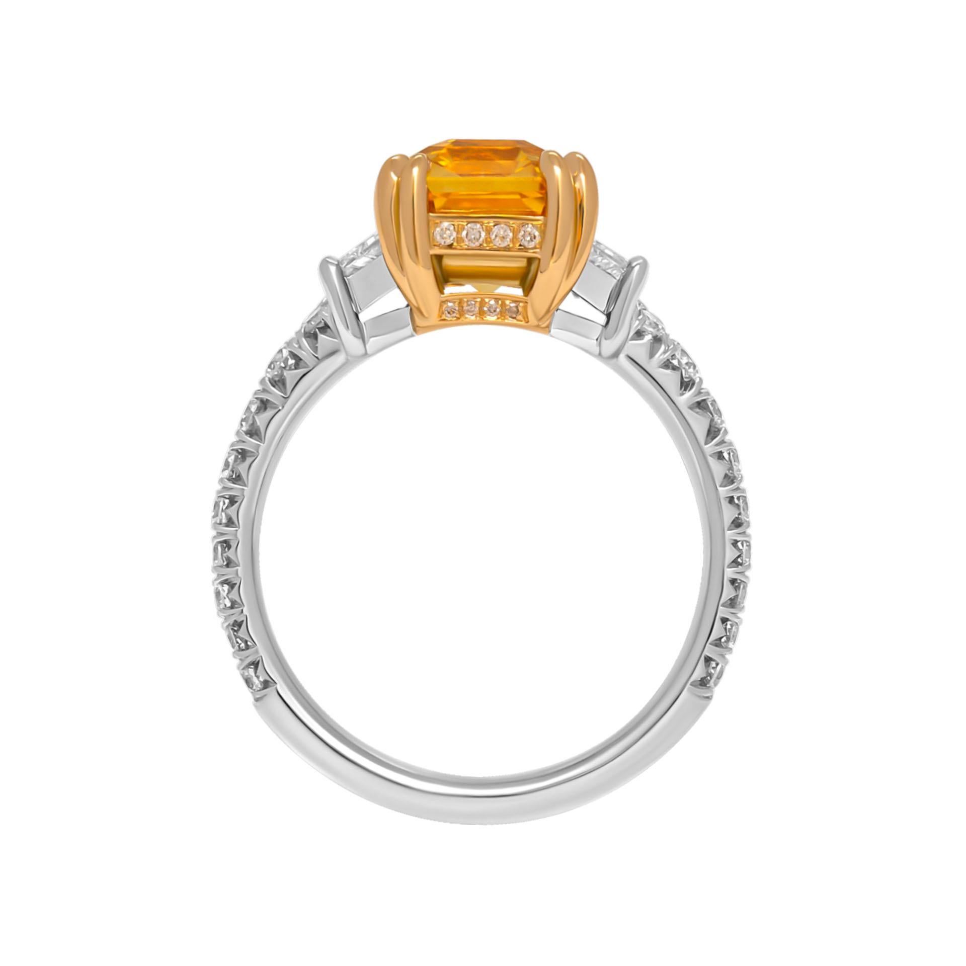 3 stone ring in PT950&18K Yellow Gold

Center: 5.02ct Yellow Sapphire Emerald Cut
Side stones: 0.76ct F/VS trapezoids

Diamond shank; diamond center wire
Total Carat Weight: 0.45ct
Size:6.5
