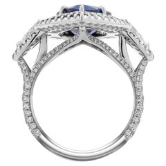 GIA Certified 3-Stone Ring with 5.04 Carat Sapphire Pear Shape