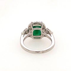 3-Stone Ring with Emerald and Diamond Pear Shapes